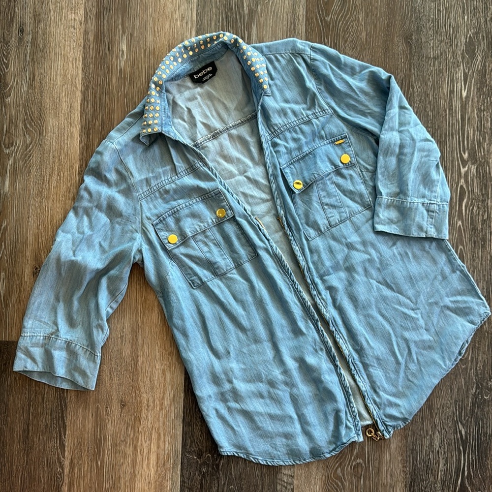 Bebe denim top with cold studs and zipper